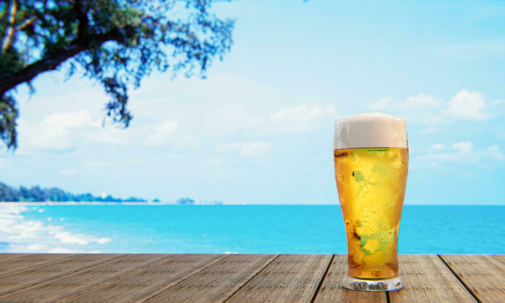 Draft or craft beer in a tall clear glass With beer foam on top And there are bubbles in the glass. Cold beer in a glass, placed on a wooden table on the beach, the sea during the day. 3D Rendering photo