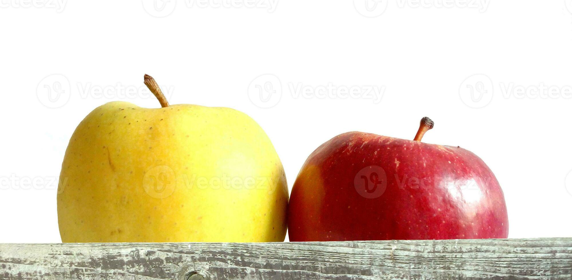 two apples, yellow and red photo