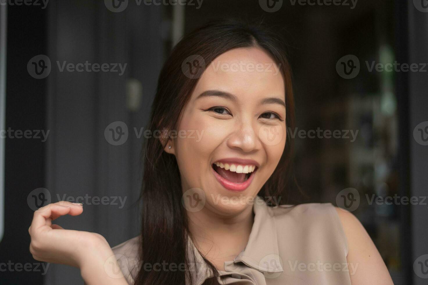 Close up  face of young  pretty asian woman smiling photo