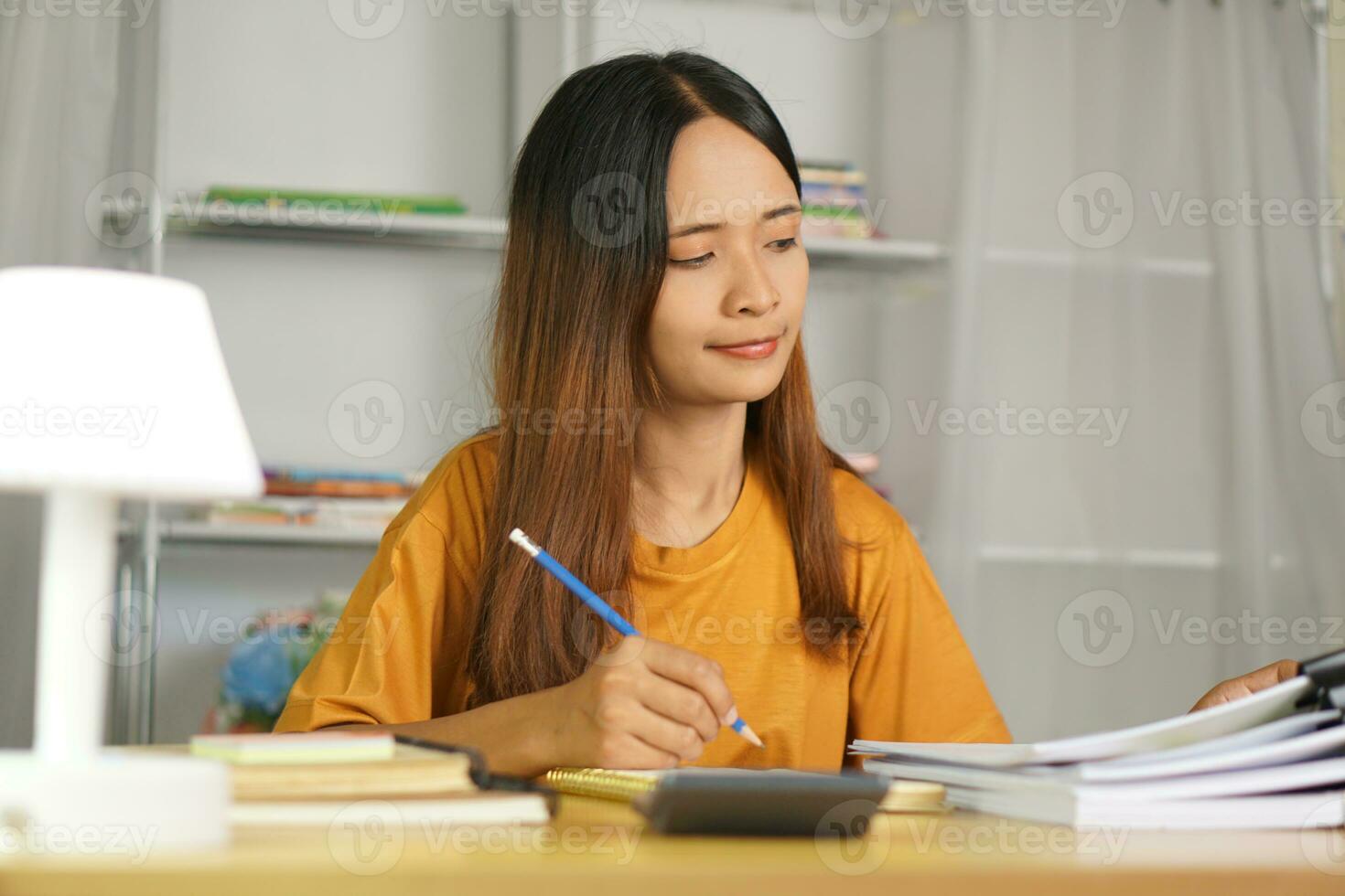 Asian women bring home work photo