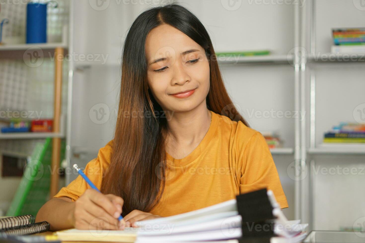 Asian women bring home work photo