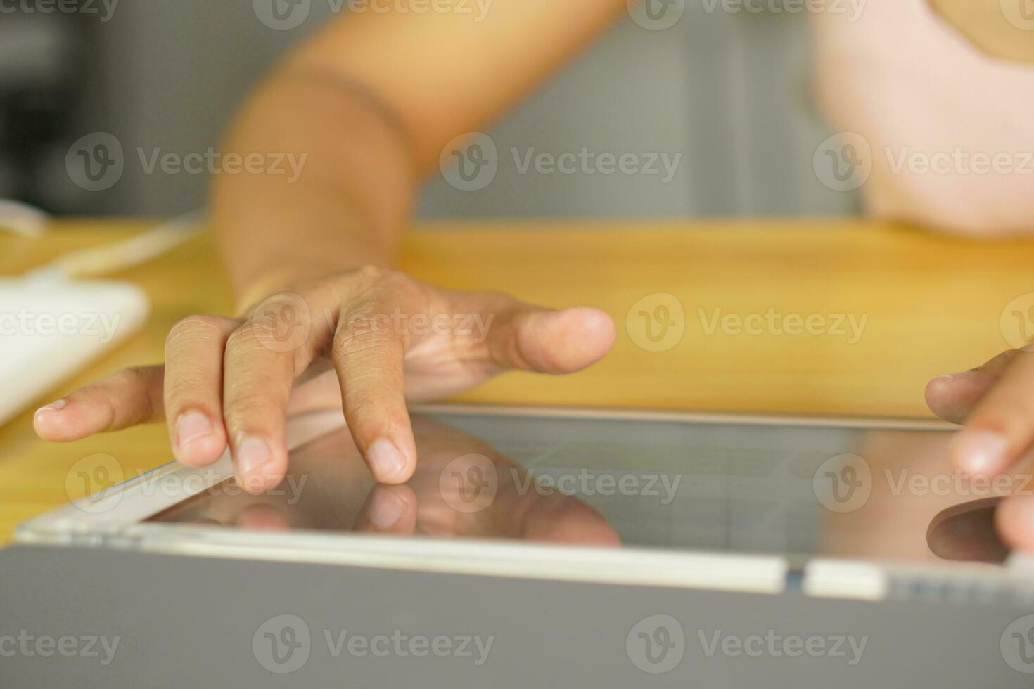 woman working at home Use the computer to communicate with the work team. photo
