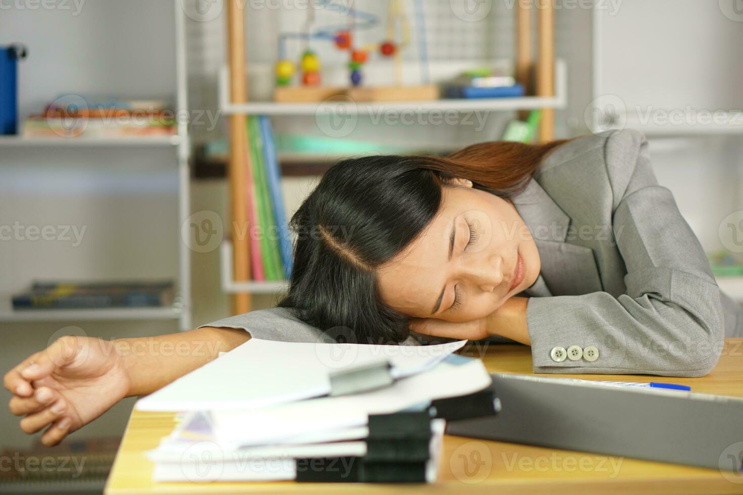 Businesswoman is sleepy at work photo