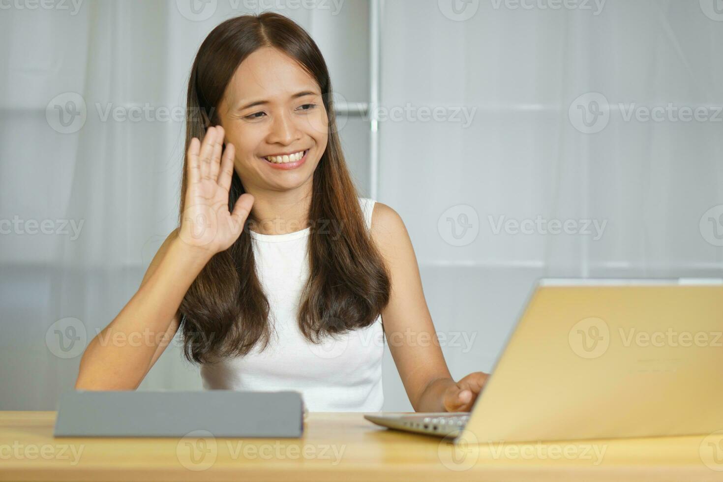 business woman working at home Contact the team using the computer. photo
