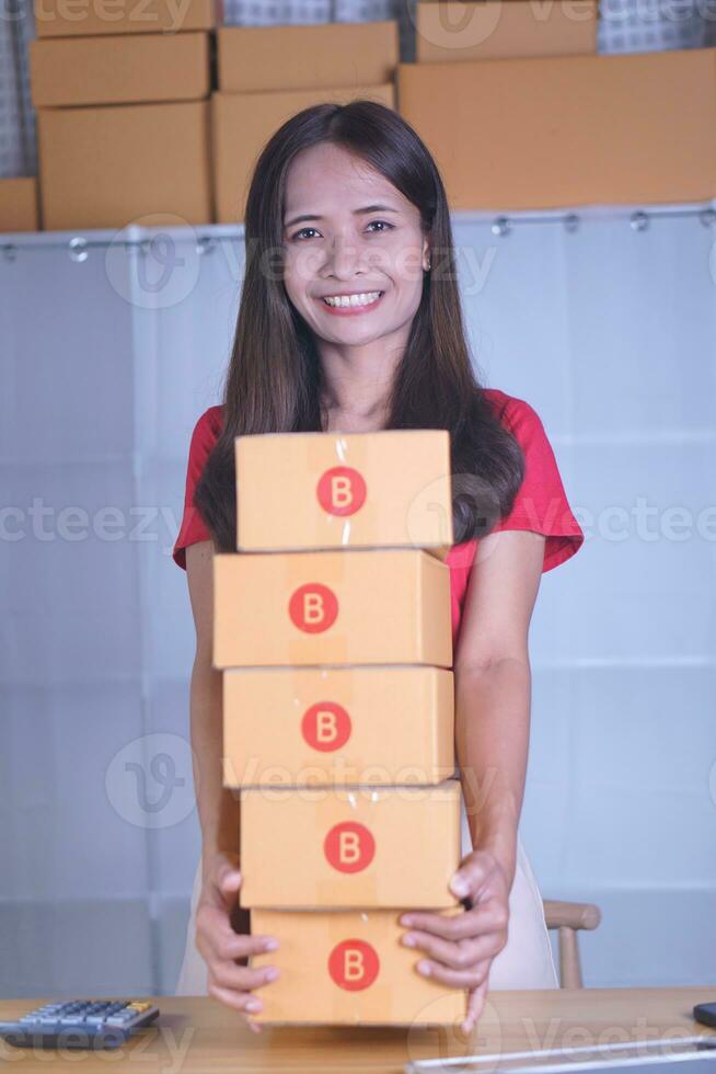 Online sellers check product quantities. before sending products to customers photo