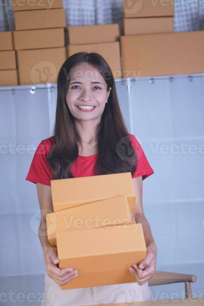 Online merchants view purchase orders via computer. to deliver products to customers photo