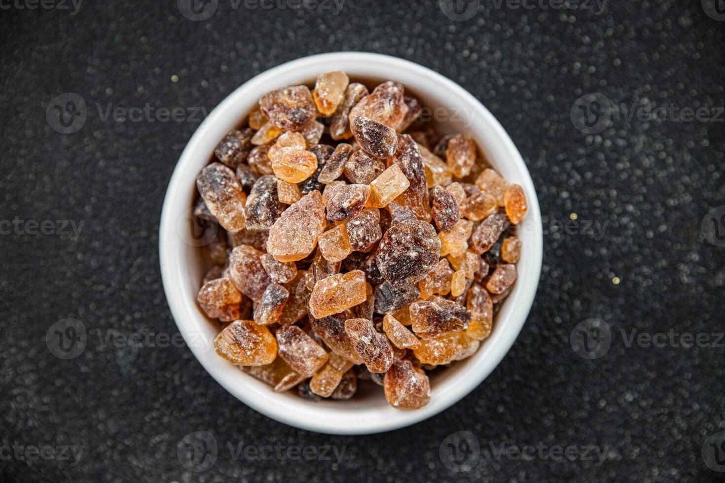 rock sugar crystals pieces candy brown sugar candied big rock caramel taste cane sugar healthy eating cooking appetizer meal food snack on the table photo