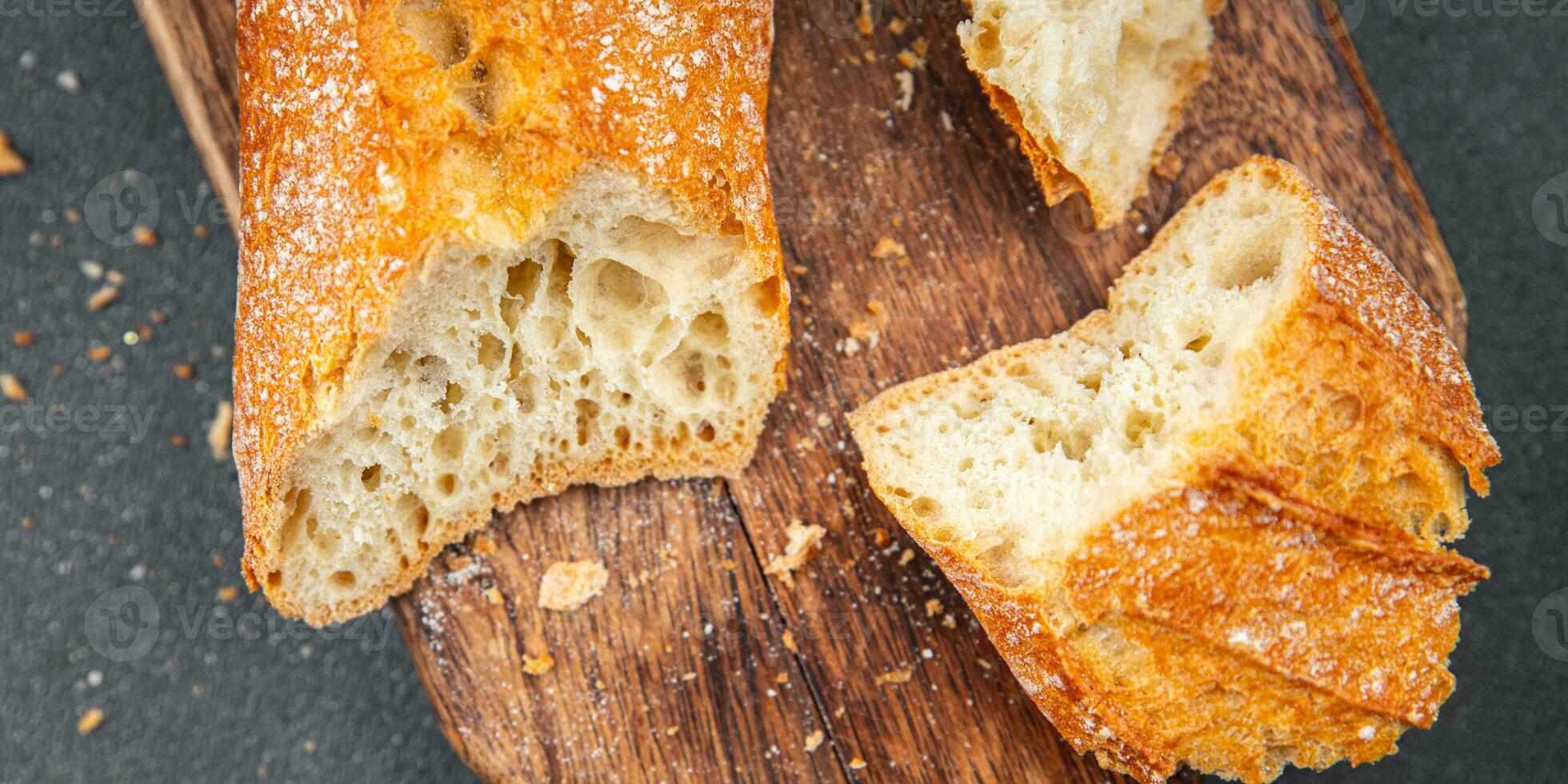 tasty baguette fresh bread long bun snack appetizer meal food on the table copy space food background rustic top view photo