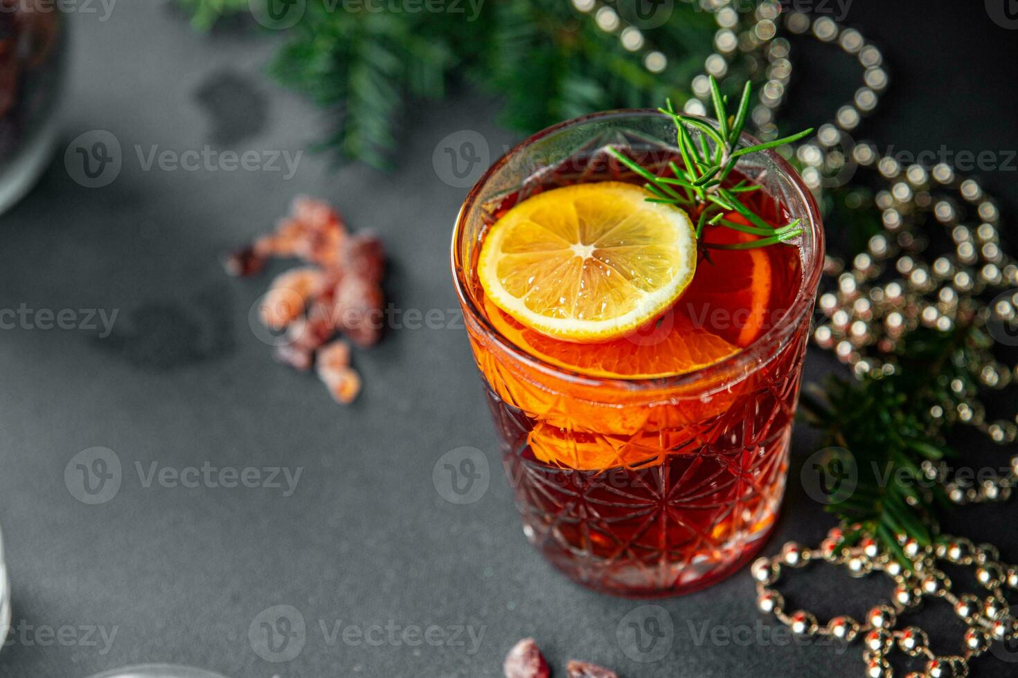 mulled wine christmas cocktail citrus and rosemary traditional drink new year holiday appetizer meal food on the table copy space food background rustic top view photo