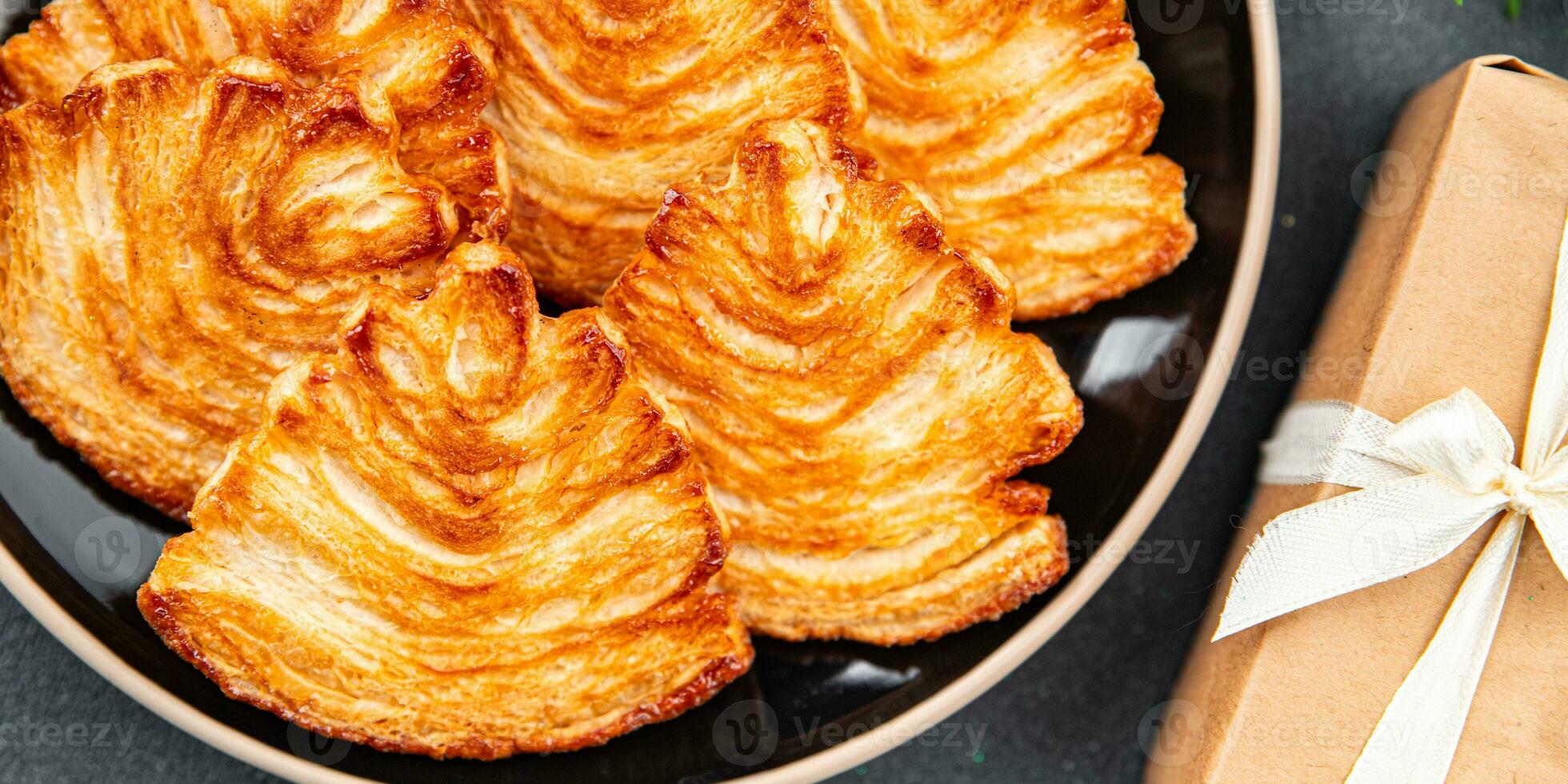 cookie puff pastry sweet biscuit christmas dessert puff sfoglie holiday treat new year and christmas celebration meal food snack on the table copy space food background rustic top view photo