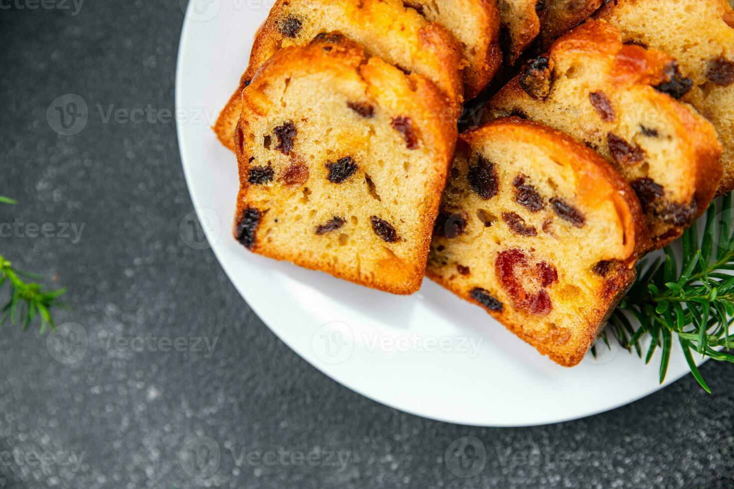 Christmas fruit cake sweet pastry dried fruit cherrie, dried apricot, prune, raisin sweet dessert holiday treat new year and christmas celebration meal food snack on the table copy space food photo