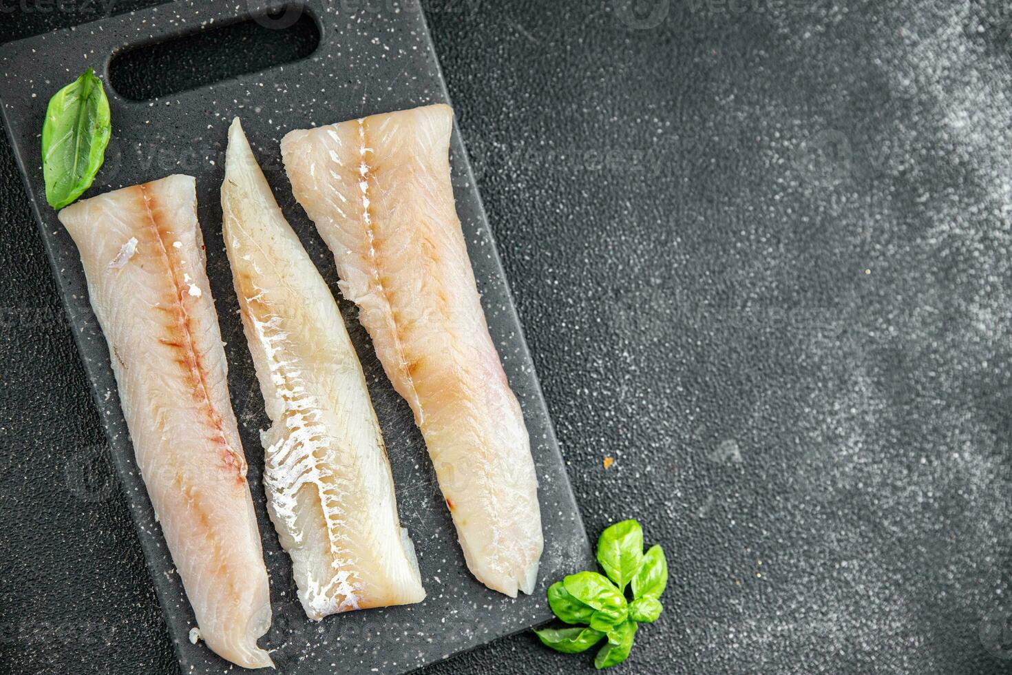 blue whiting fish fillet fresh seafood healthy eating cooking appetizer meal food snack on the table copy space food background rustic top view photo