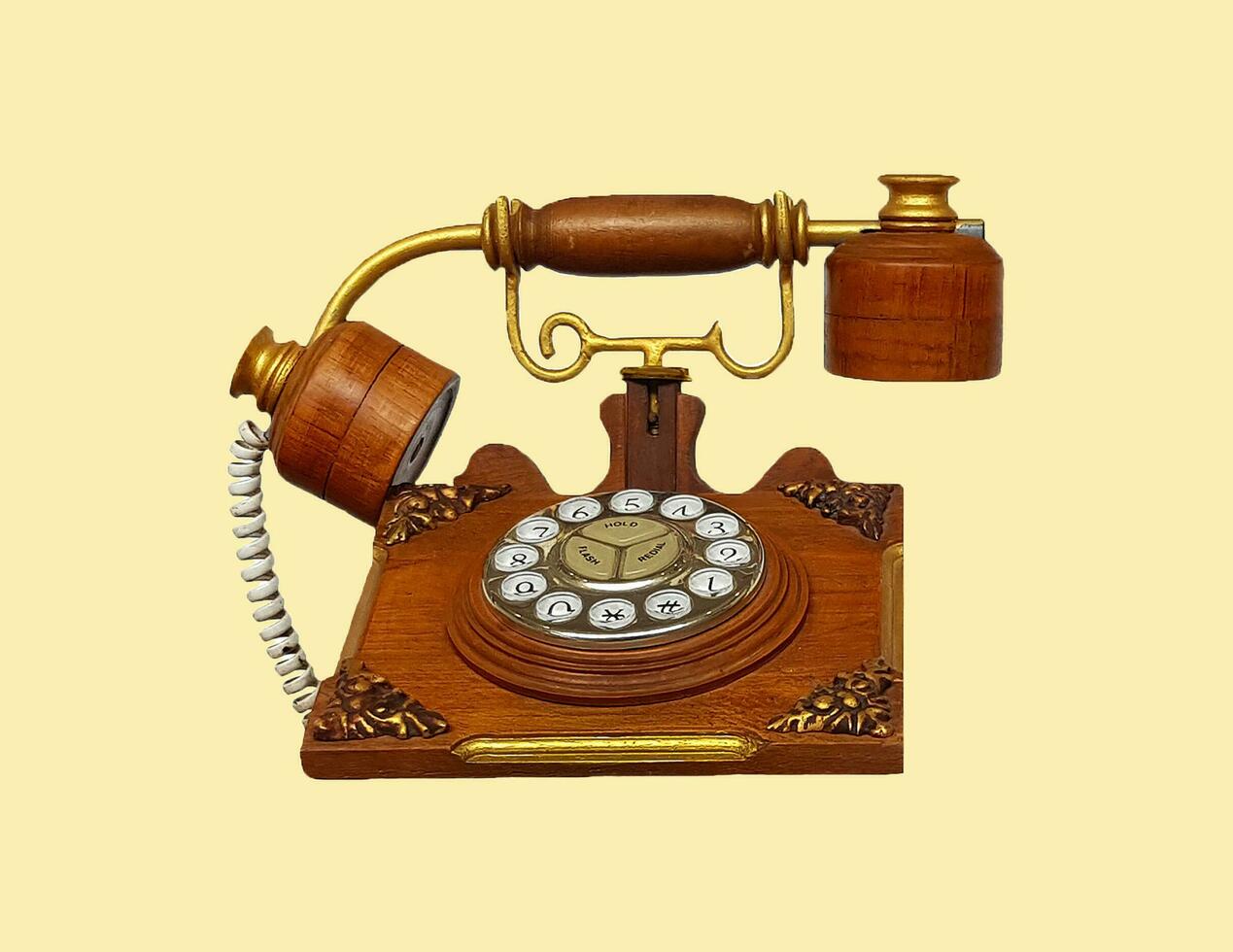 Vintage phone, Wooden telephone isolated on yellow pastel color background with clipping path. Communication and Old technology in retro style. This object made by wood with a redesign photo