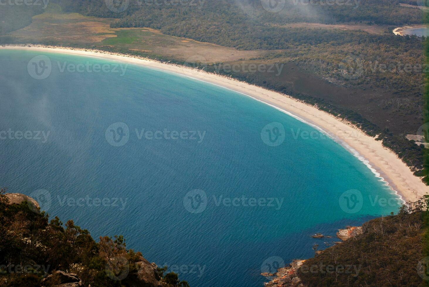 Wine glass bay as seen from Mount Amos Tasmania photo