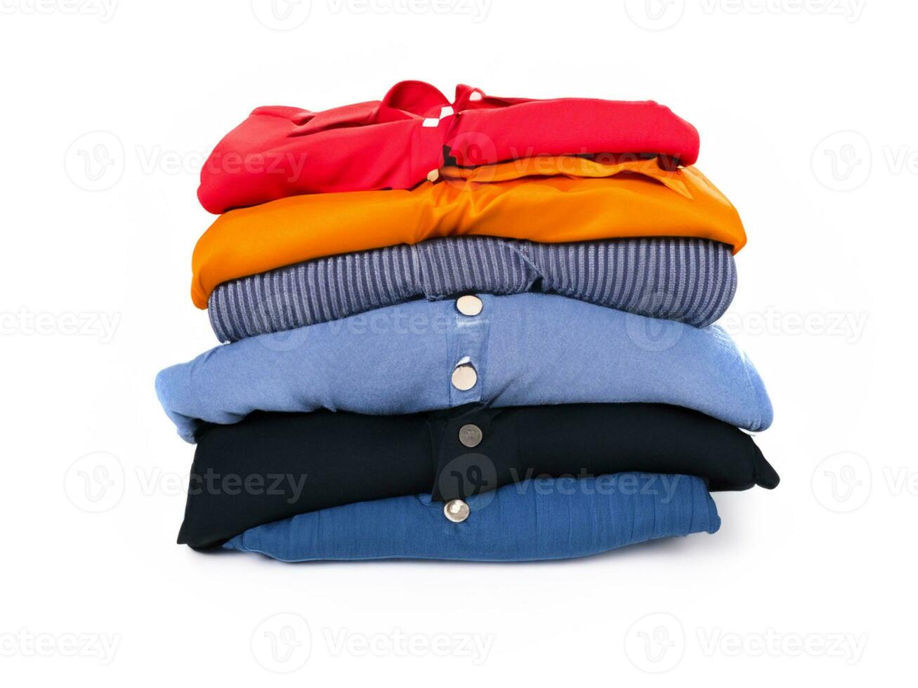 pile of different clothes, on white isolated background. photo