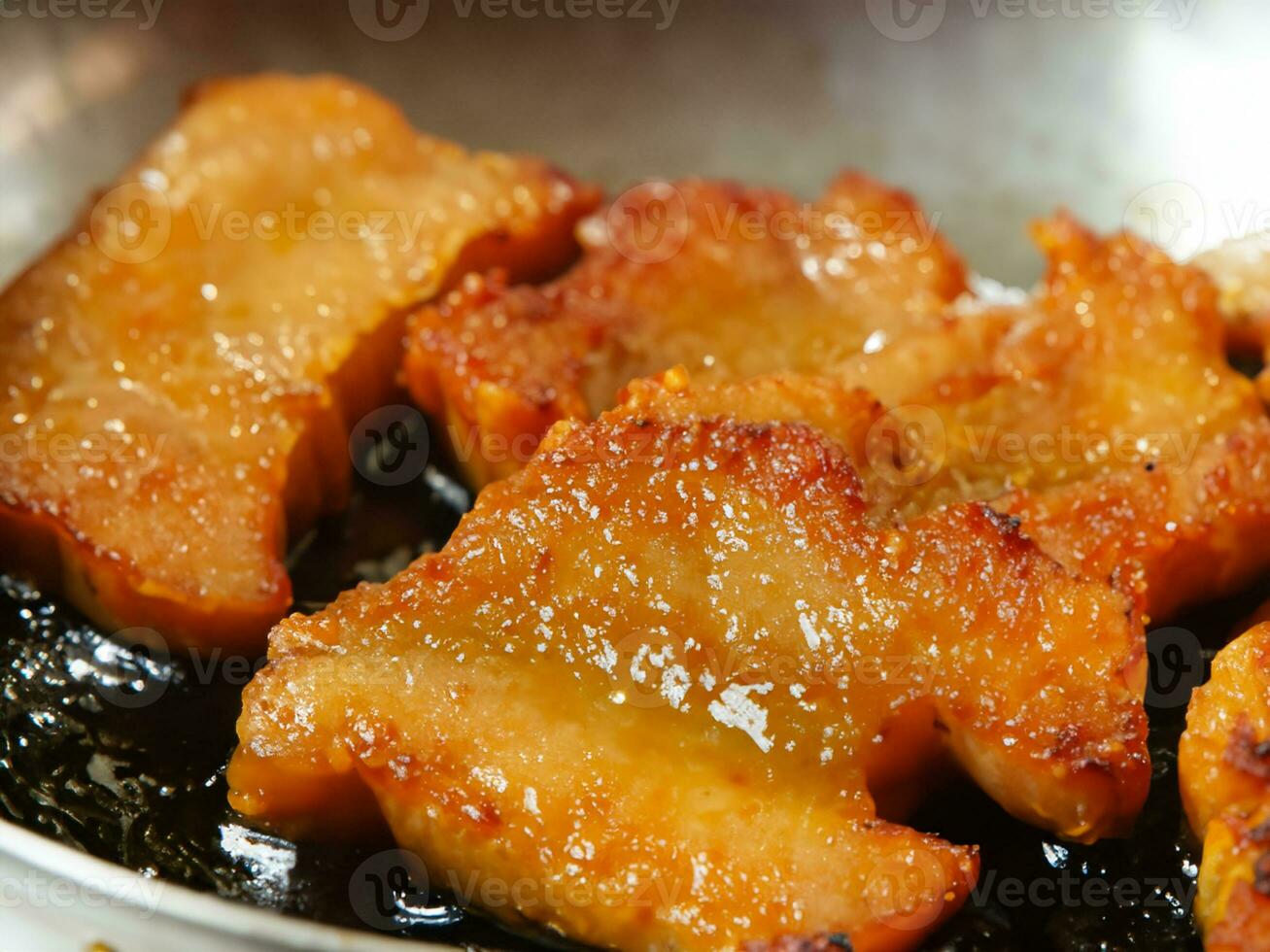 pork fried in the pan photo