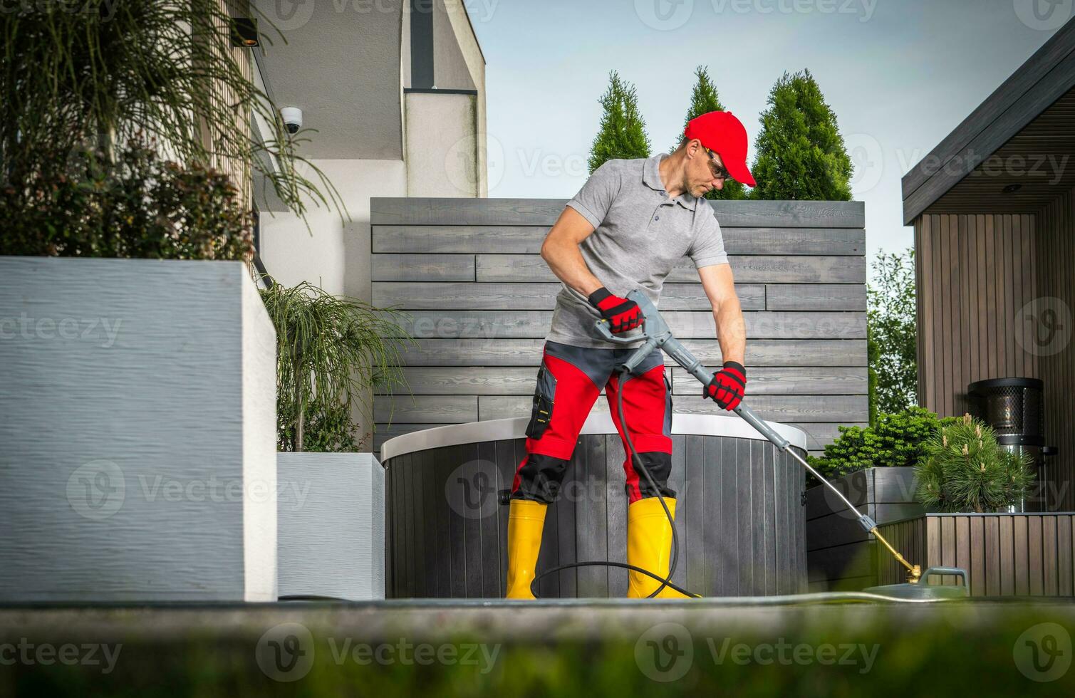 Patio Concrete Bricks Cleaning Using Pressure Washer photo