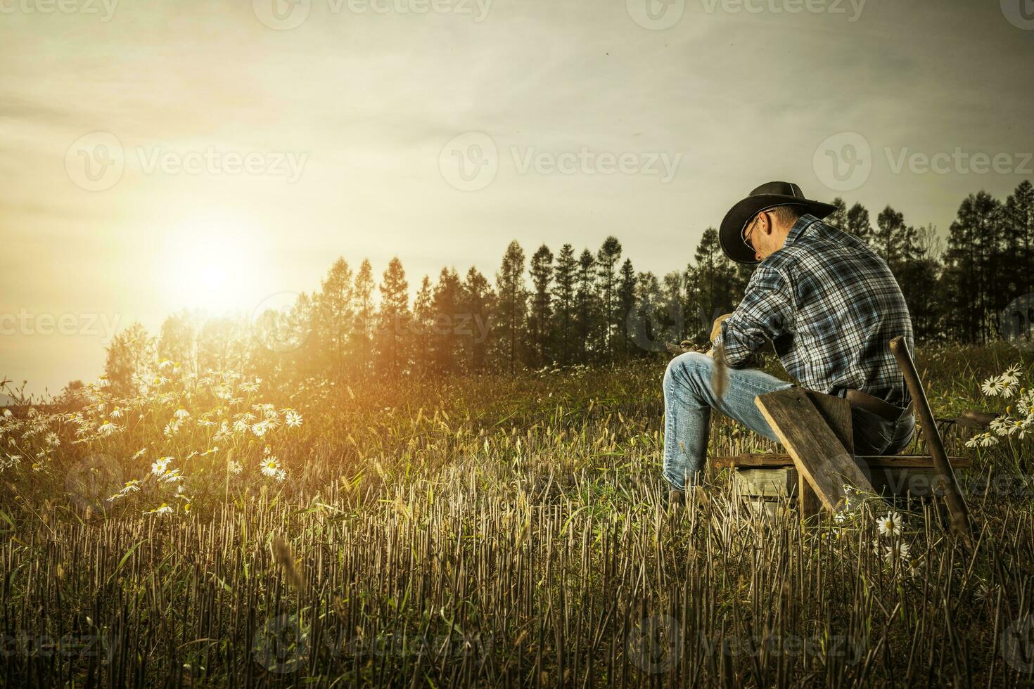 Caucasian Cowboy Enjoying His Countryside Life photo