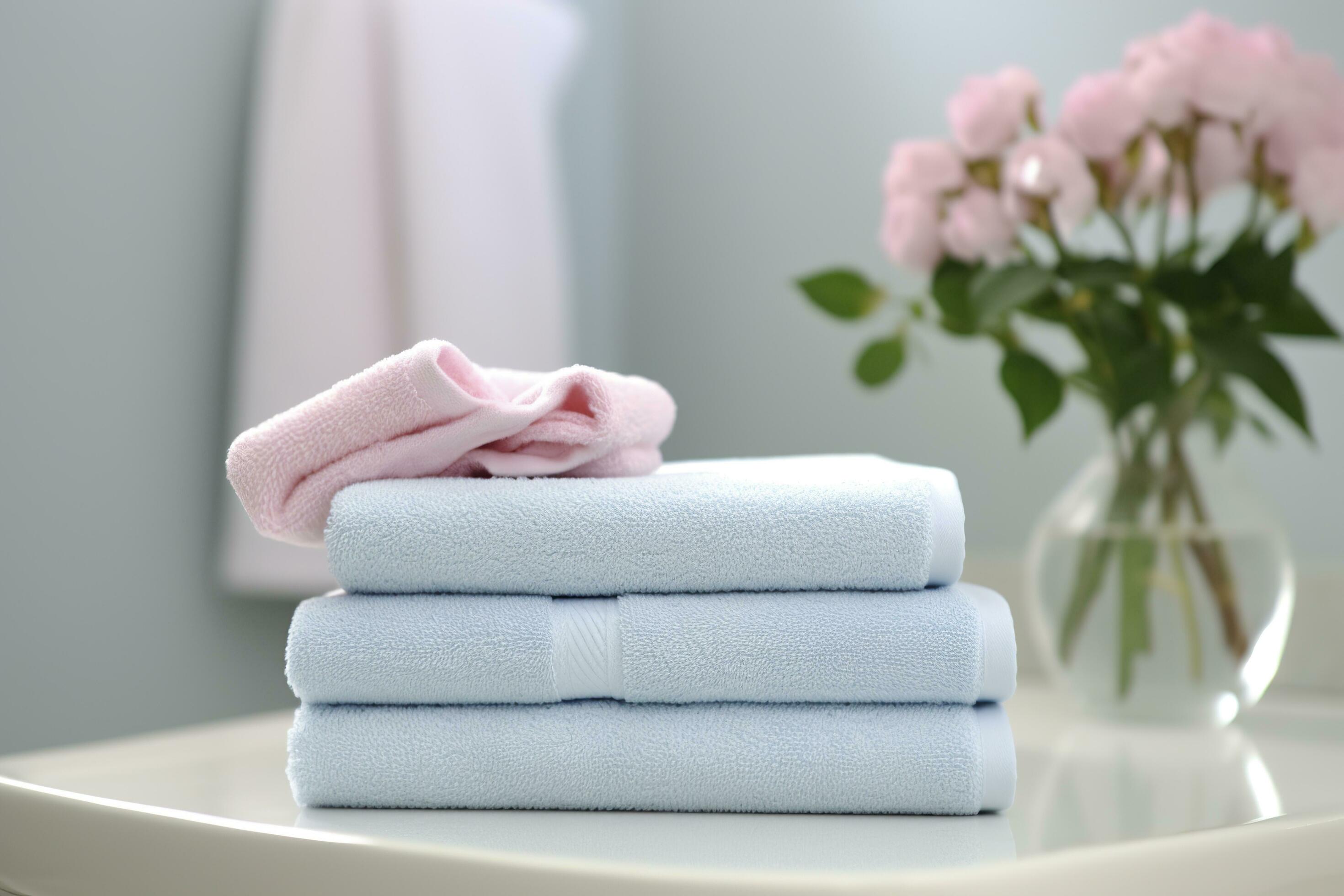 the world's softest towels against a minimalistic background. Stacked