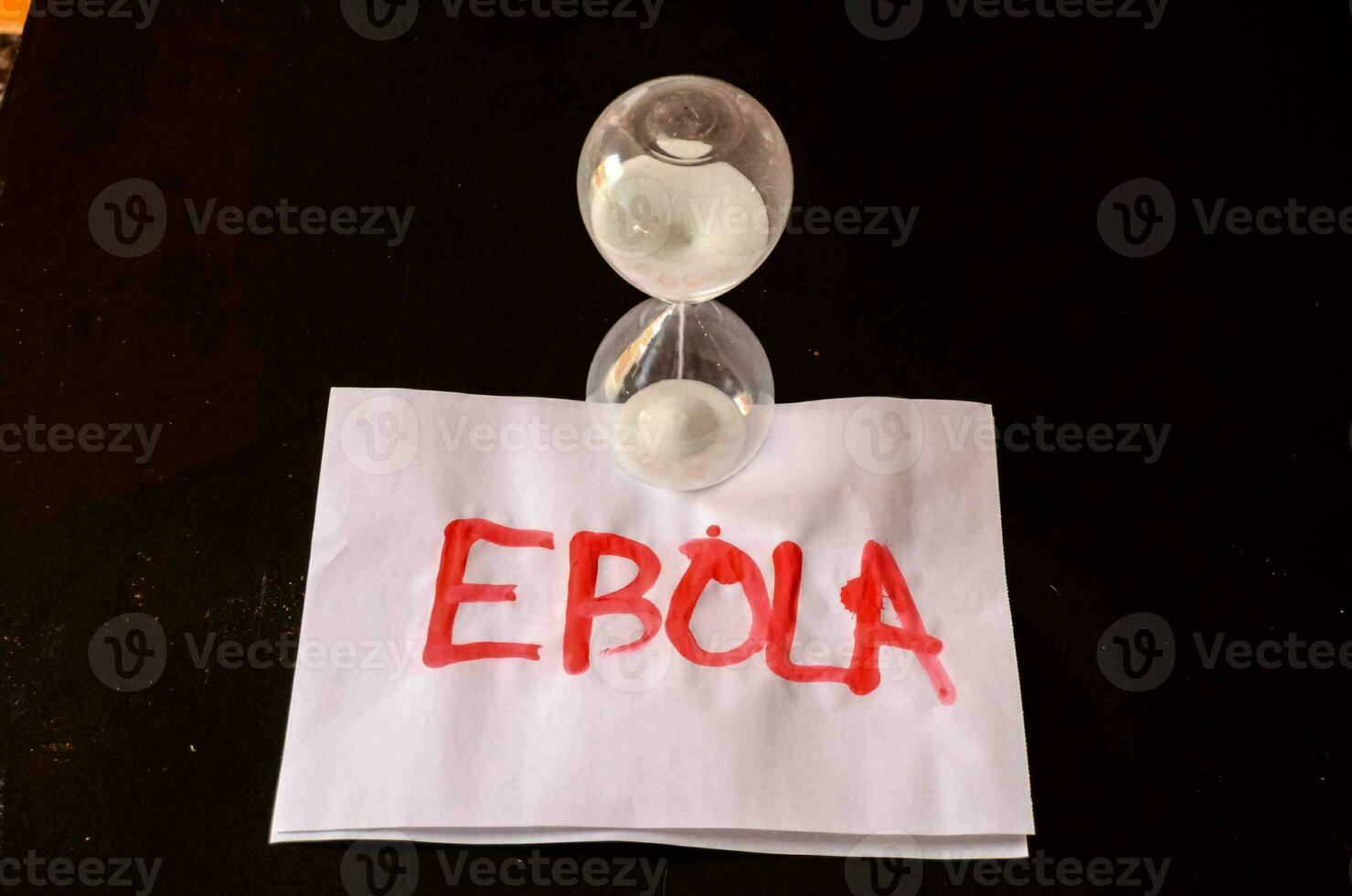 The word ebola written on paper photo