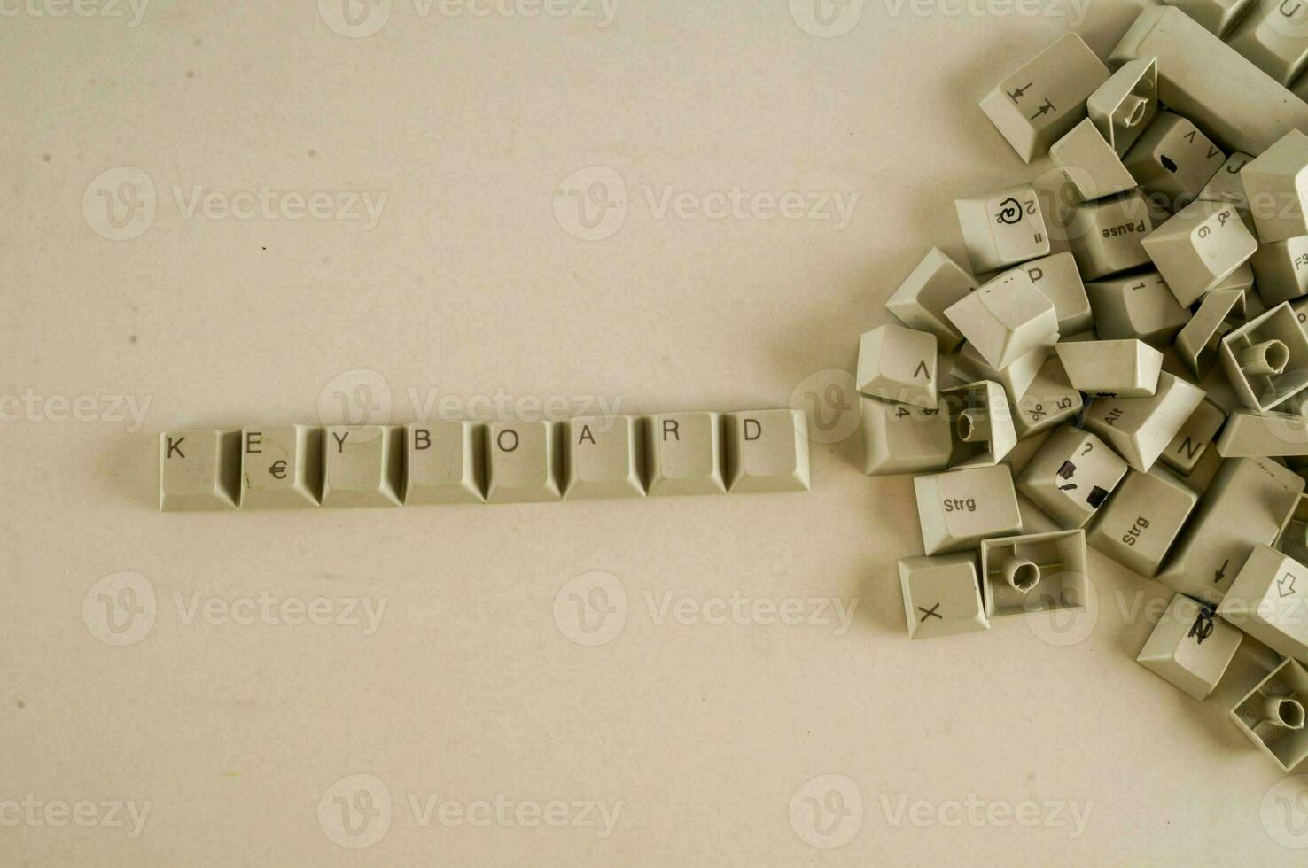 a pile of old computer keyboard keys photo