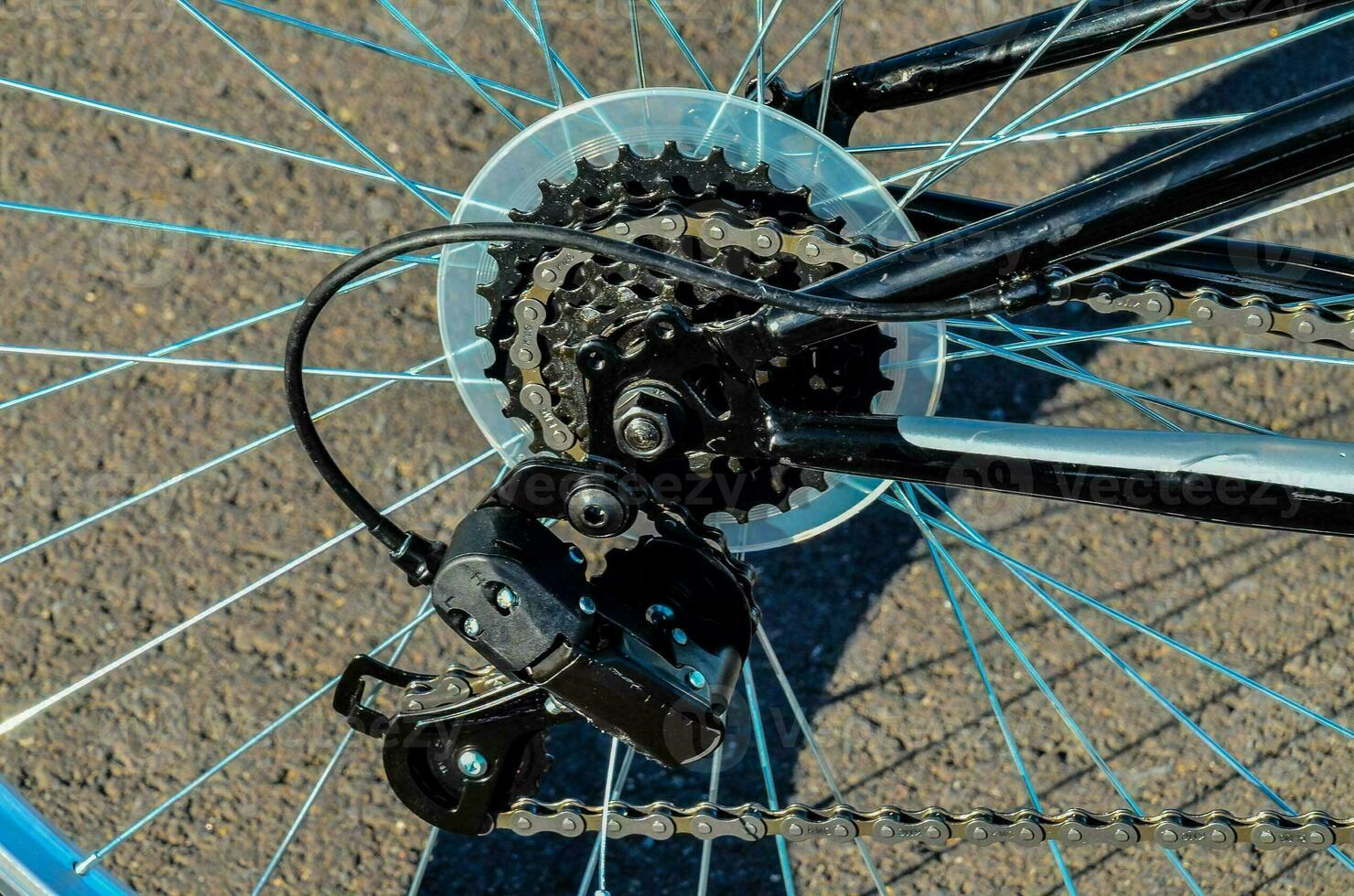 a bicycle with a chain and a wheel photo