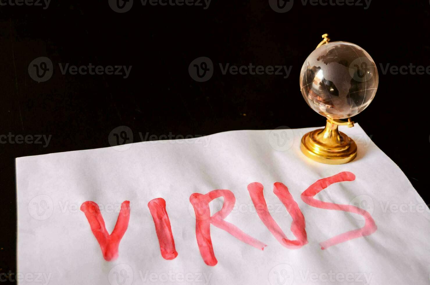 The word virus written on paper photo