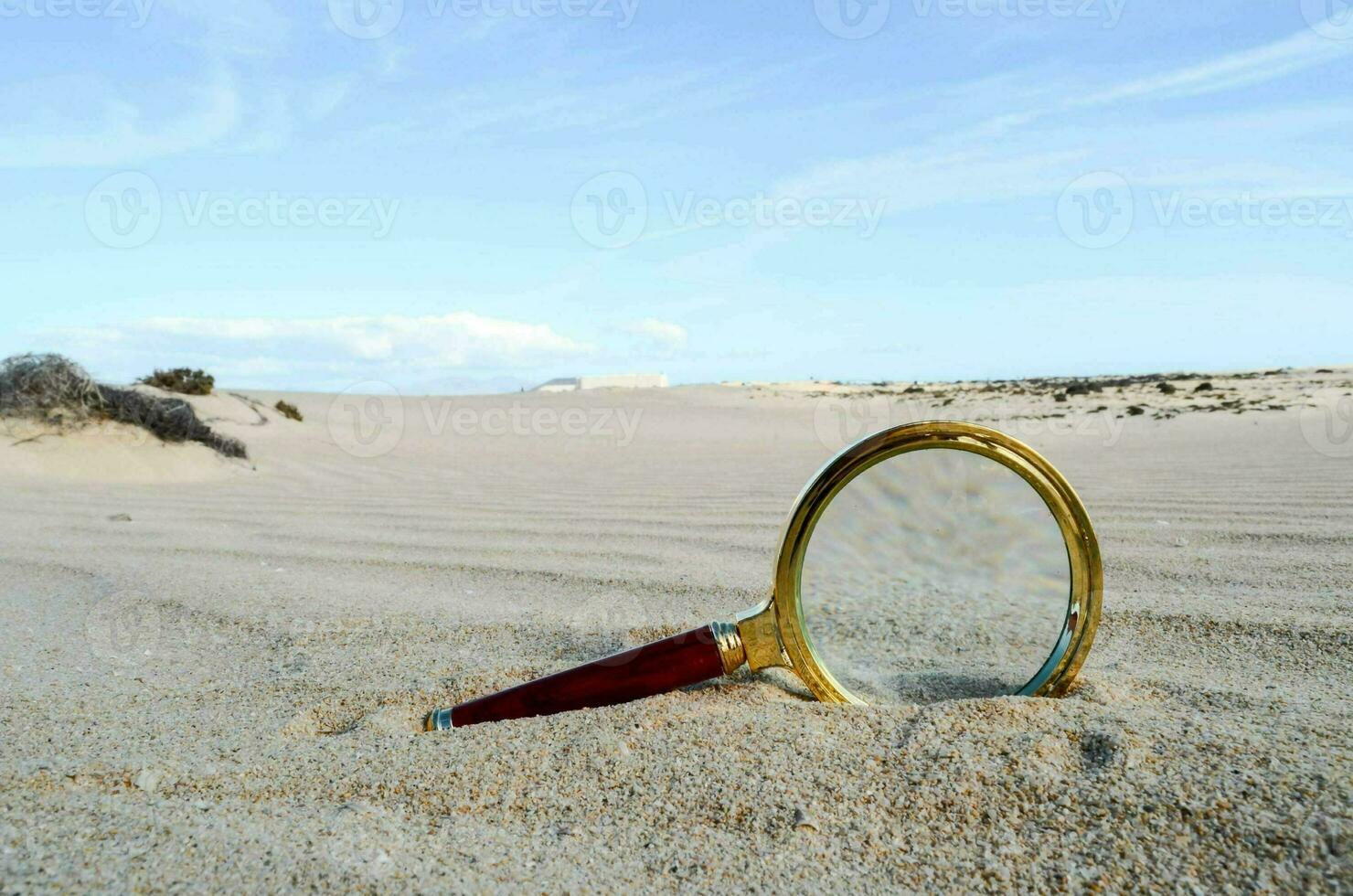 A loupe in the sand photo