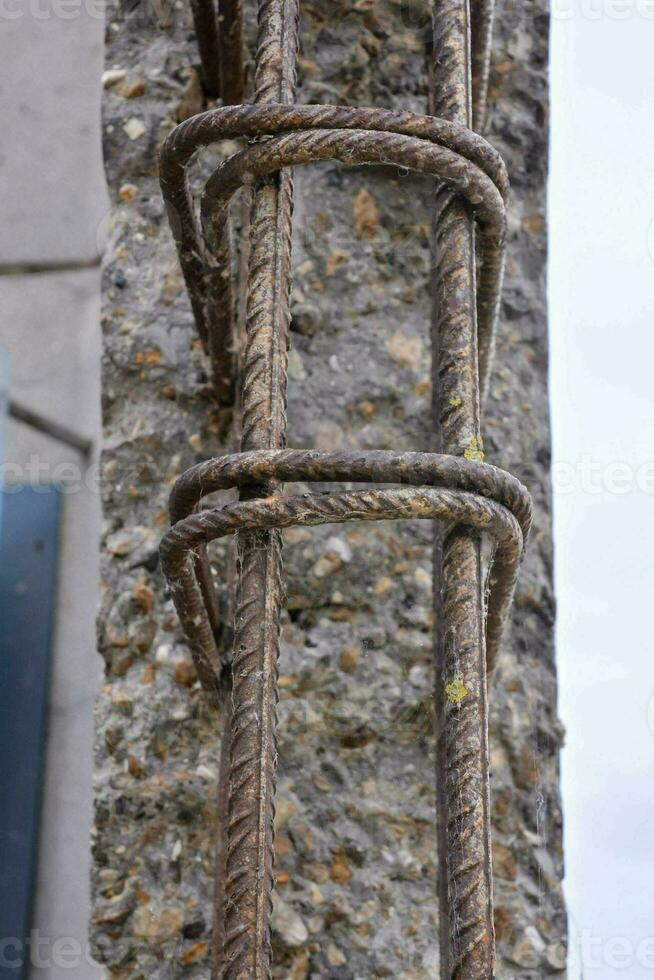 a close up of a metal ladder on a wall photo