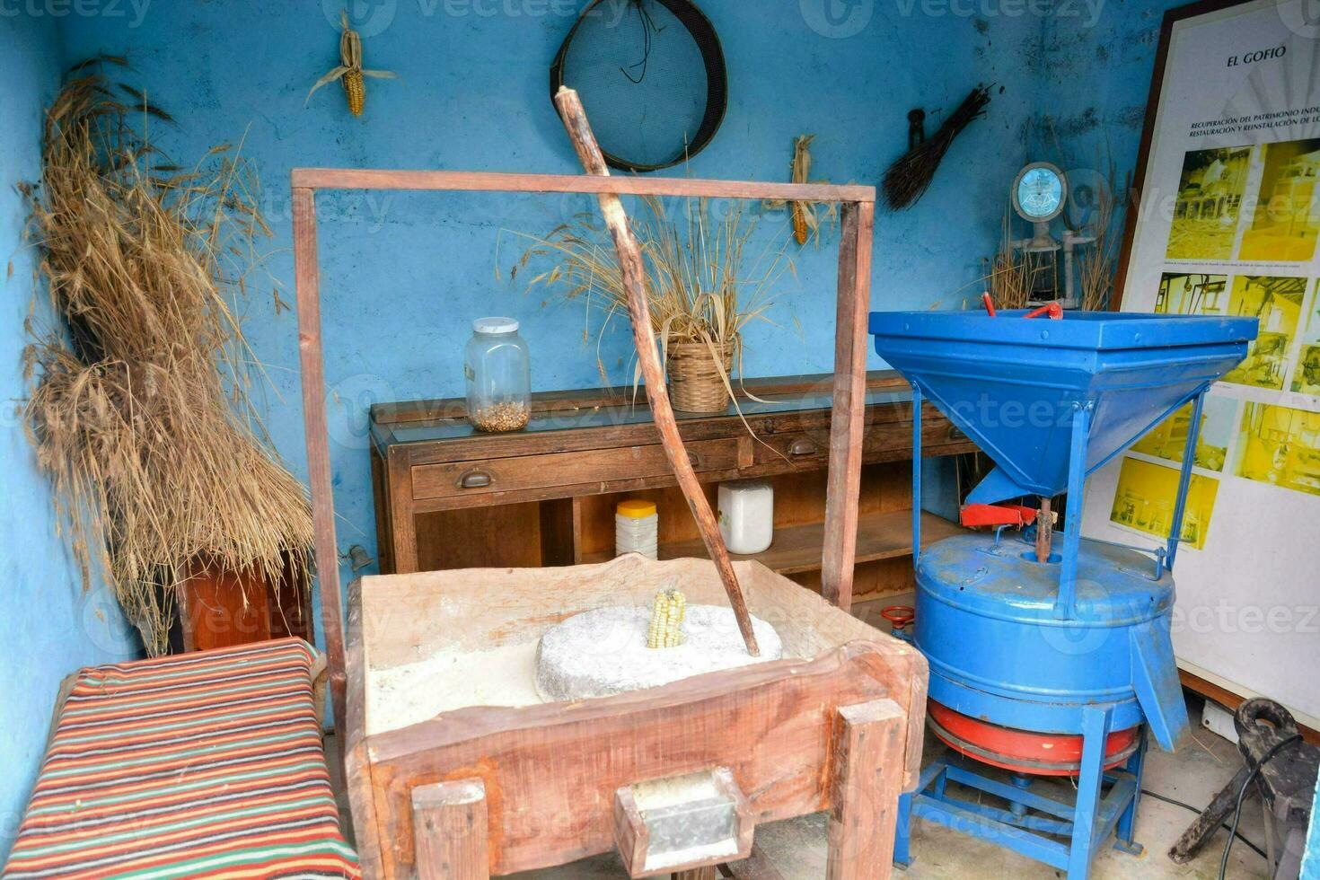 a blue room with a lot of items photo