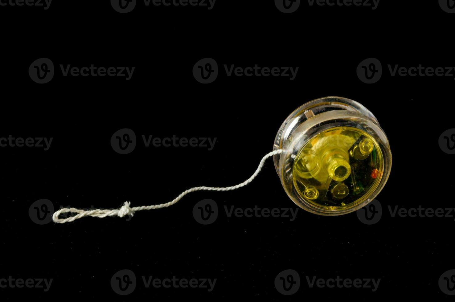 A yo-yo on black background photo