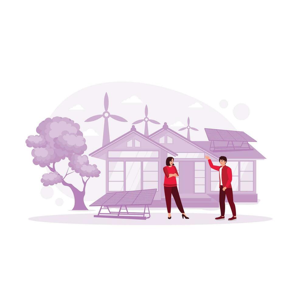 A husband and wife are standing in front of the house. Using solar panels and wind turbine technology. Eco House concept. Trend Modern vector flat illustration