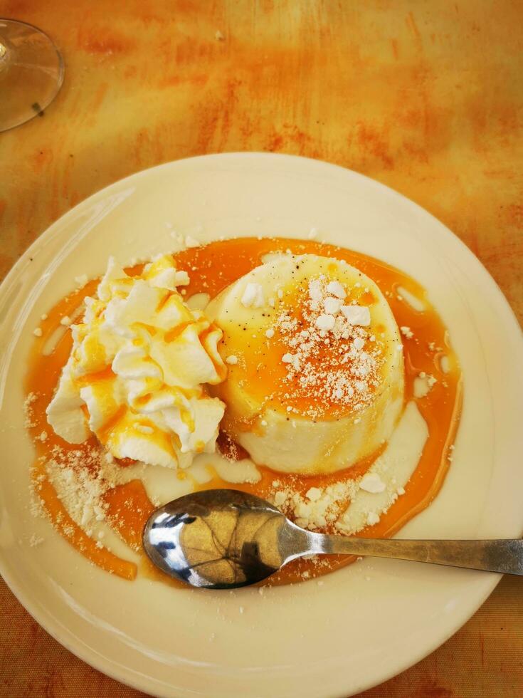 Photo of a delicious meal with a spoon on the table