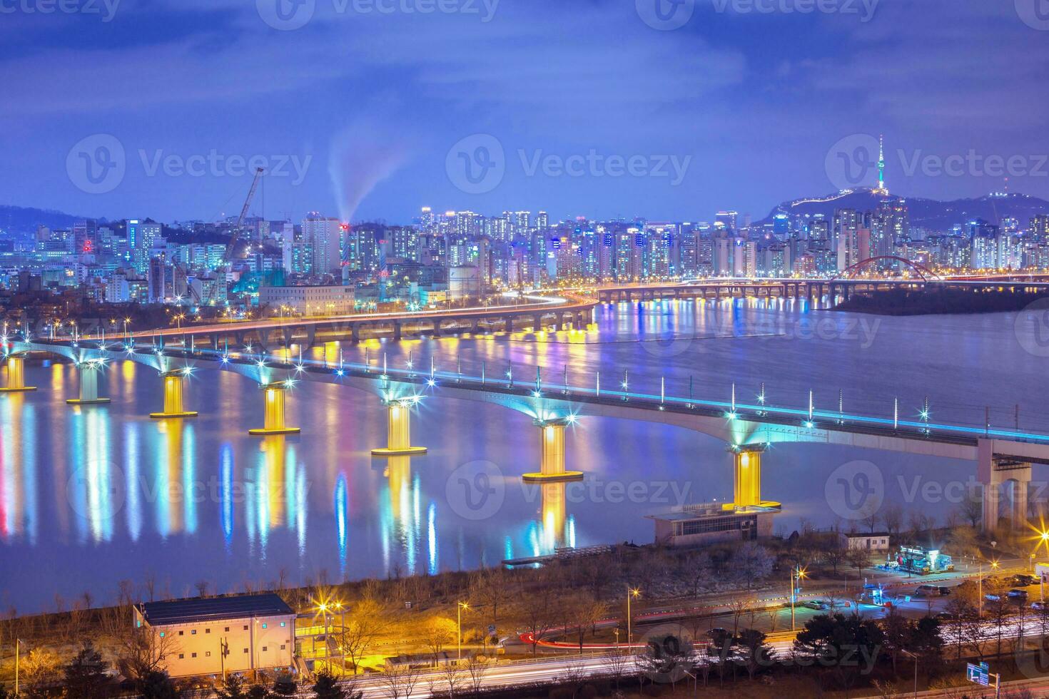 Seoul city and bridge and Traffic, Han River at Night in Downtown Seoul, South Korea. photo