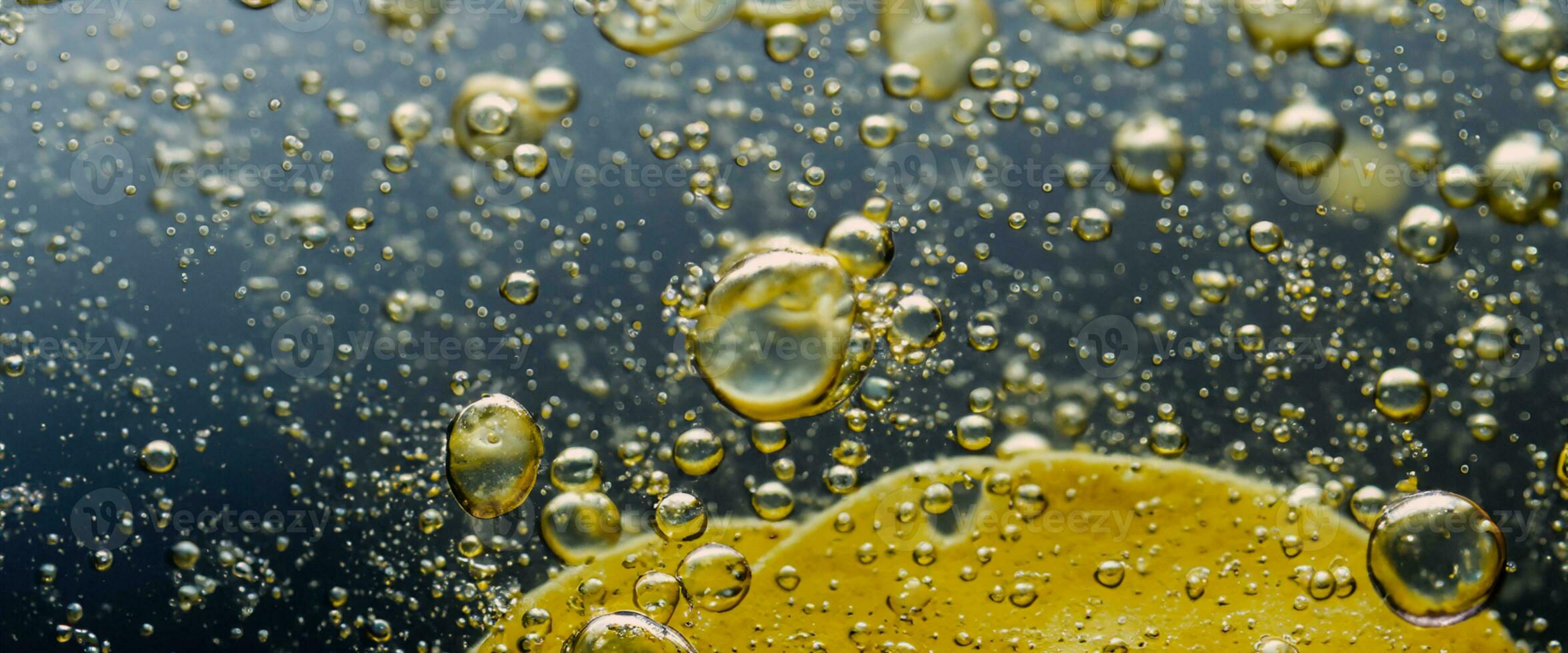 Deep fried potato chips under golden oil water. photo