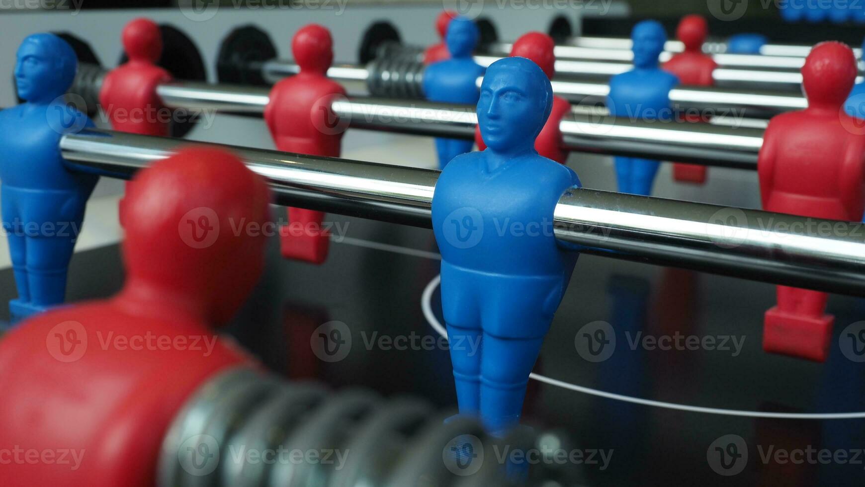 Football table or soccer table game with plastic player figurine. Mini Soccer game which famous in past and be collectable item for foosball lover. Play by two hand control each row of player figurine photo