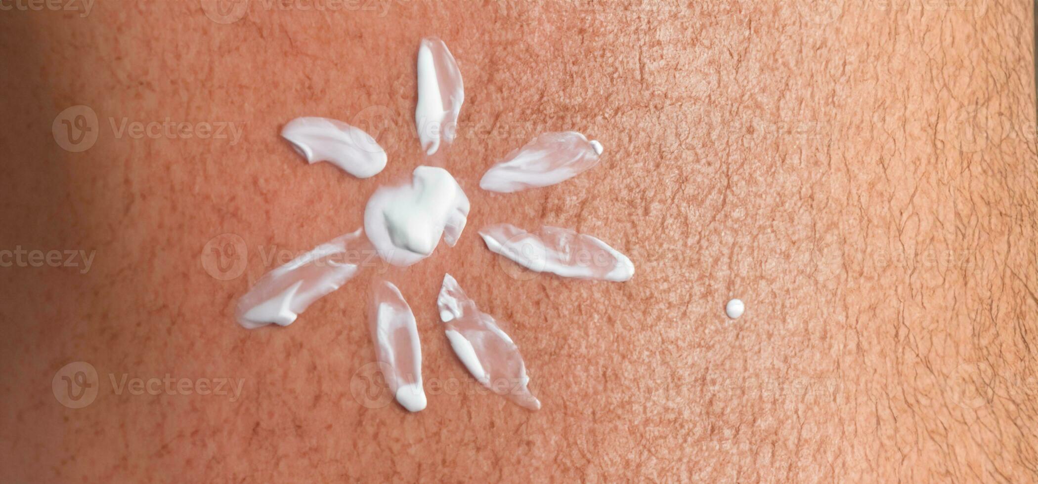 Close up of Ai Gen Sunscreen Protection or Sun Cream on human skin. photo