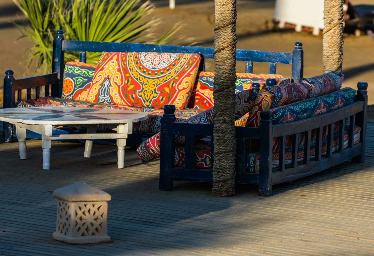 very cozy place on the beach in a resort on vacation in egypt detail photo