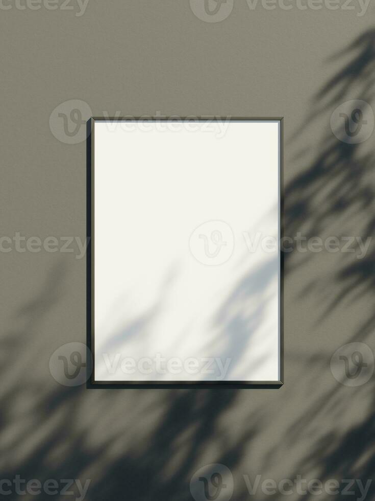 Blank frame mockup hanging on the wall with leaf shadow photo