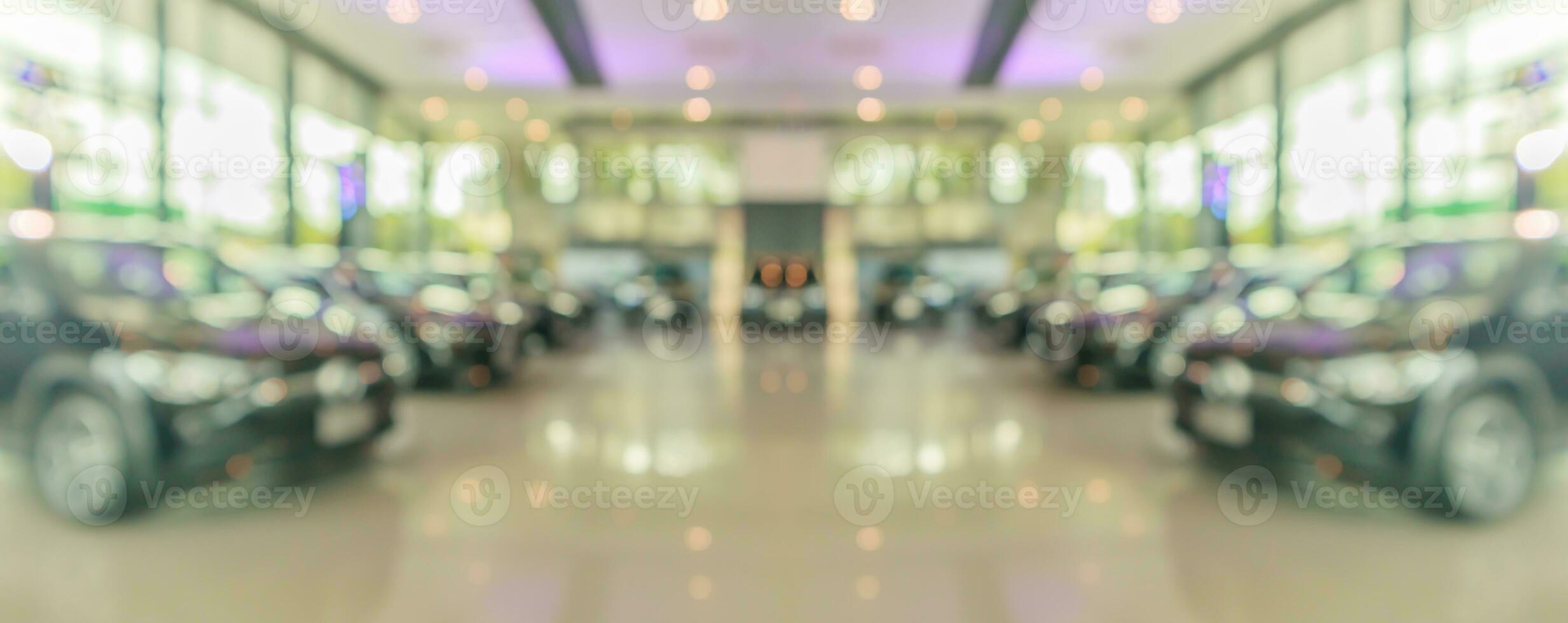 new cars in showroom interior blurred abstract background photo