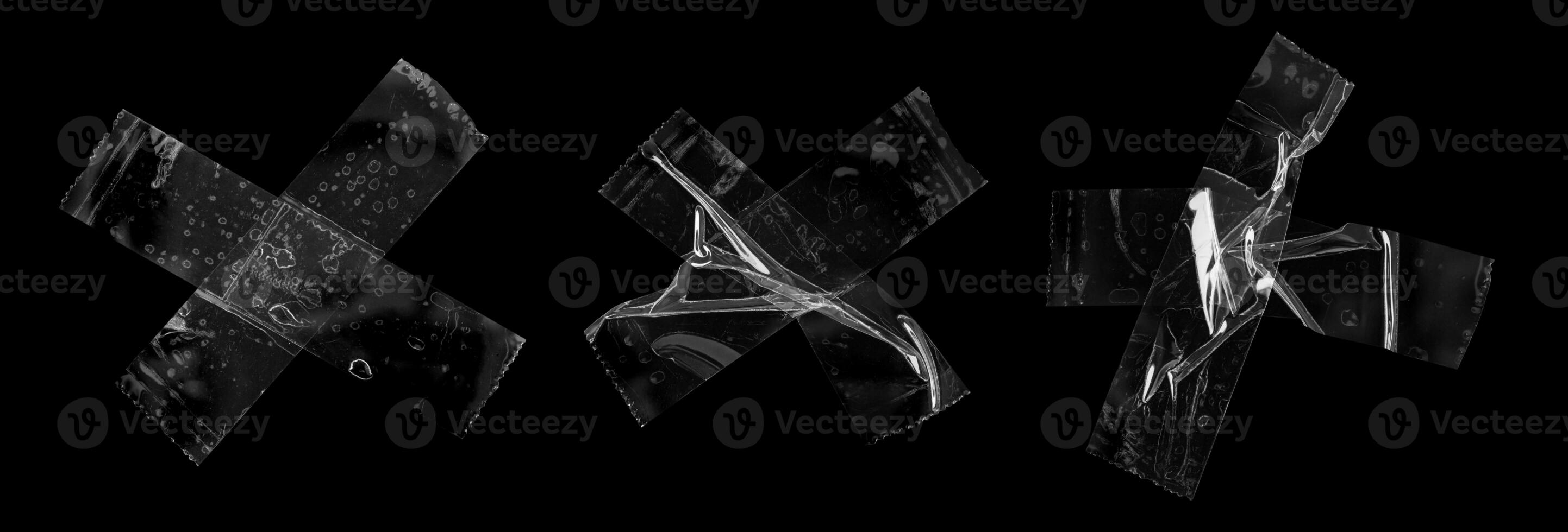 adhesive plastic tape set isolated on black background photo