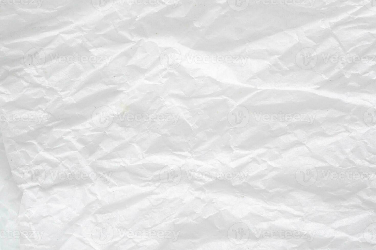 Abstract white crumpled and creased recycle paper texture background photo