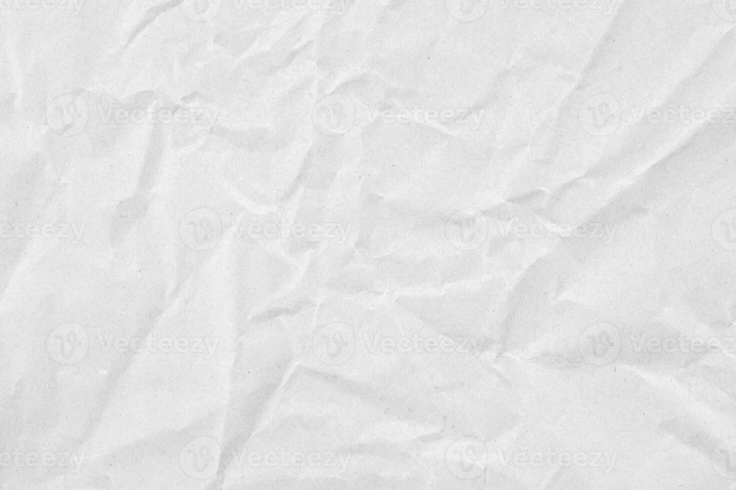 Abstract white crumpled and creased recycle paper texture background photo