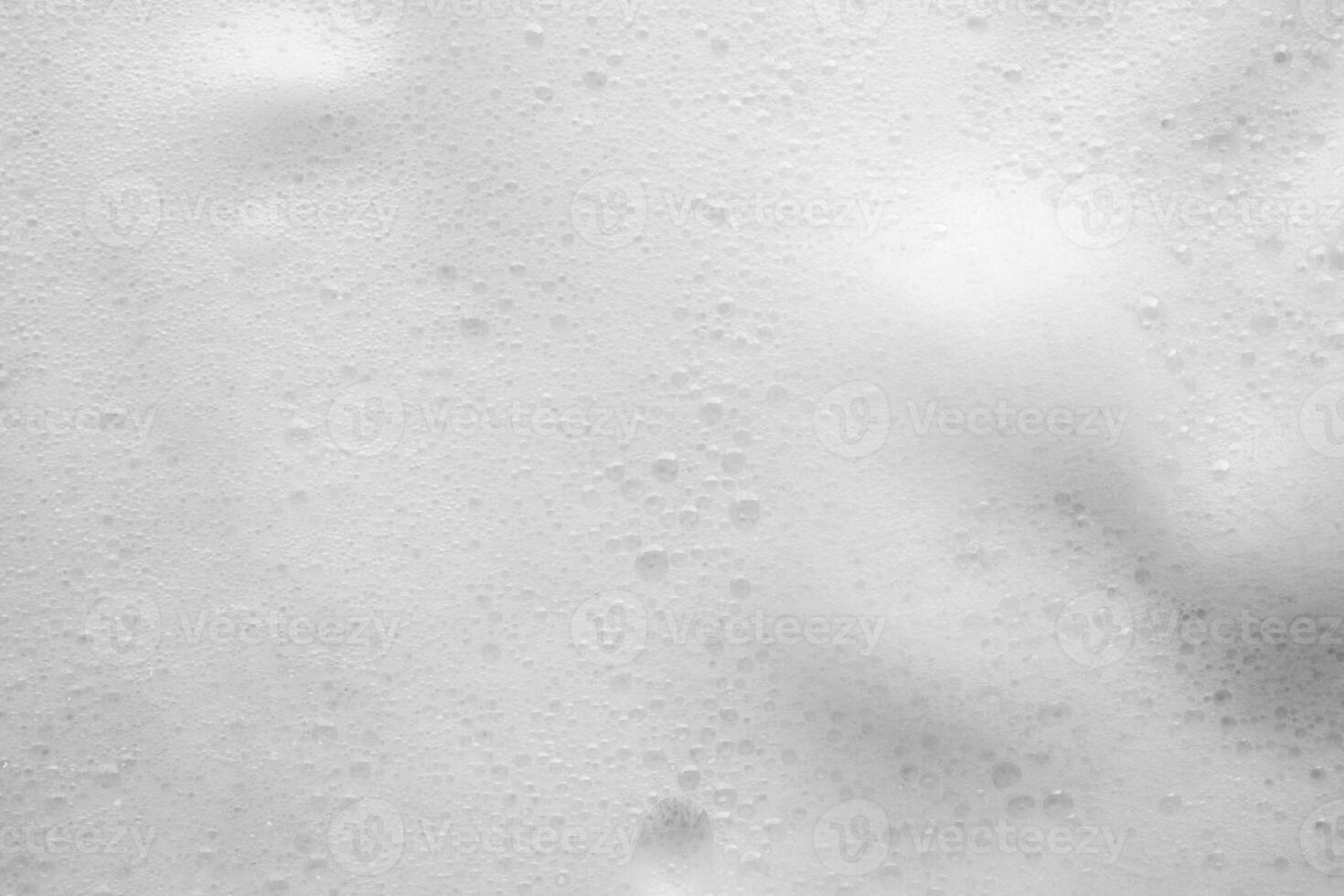 Abstract white soap foam bubbles texture background photo