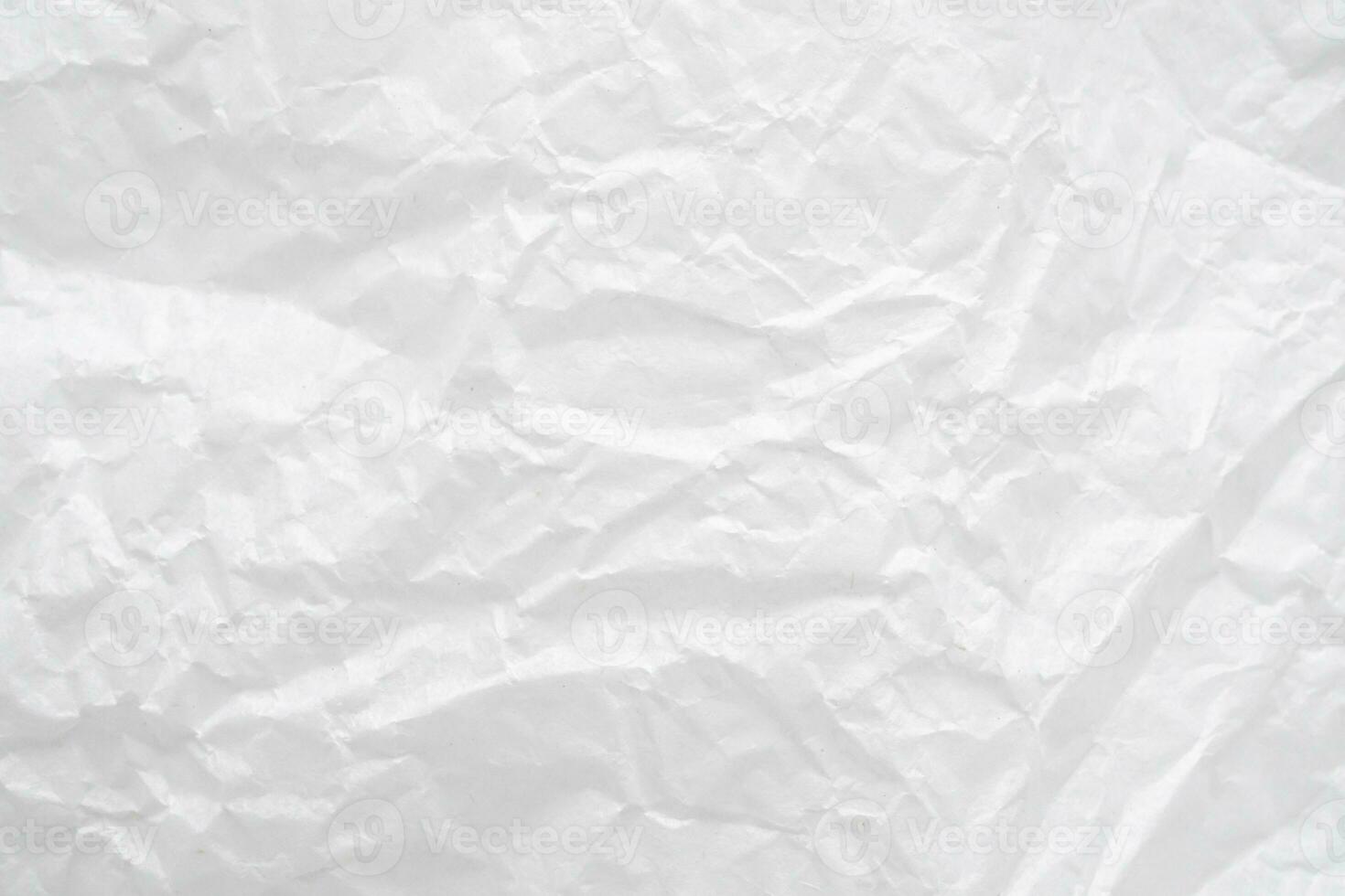 Abstract white crumpled and creased recycle paper texture background photo