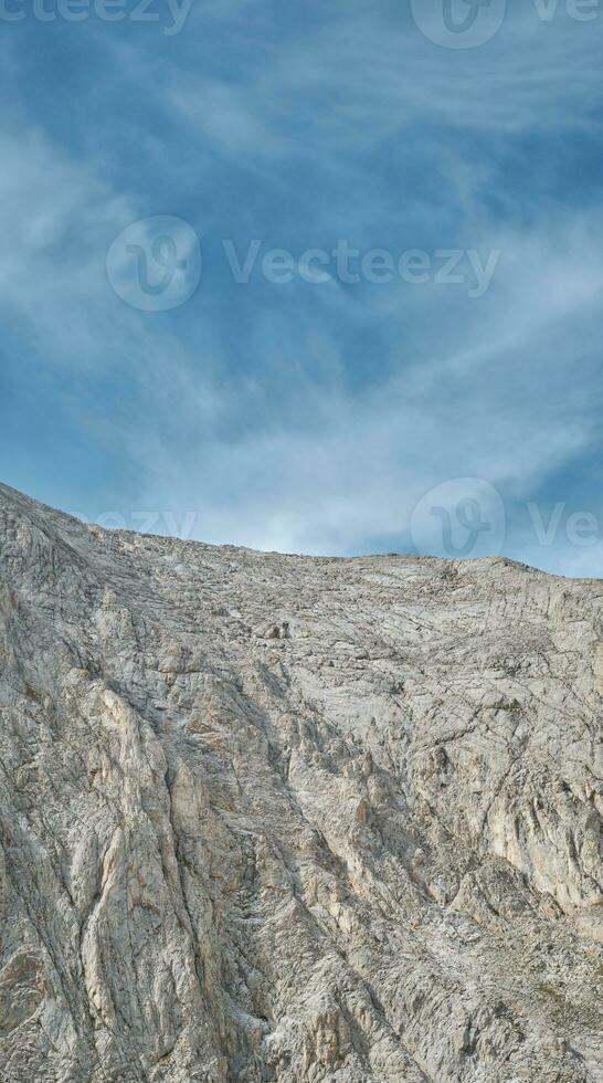 Vertical shot, view of the Vihren ridge from Kazana Shelter, active recreation and hiking photo