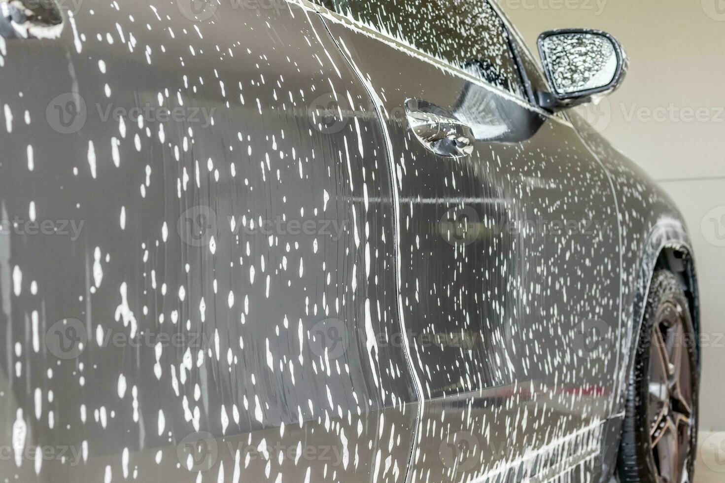 coche limpieza y Lavado con espuma jabón foto