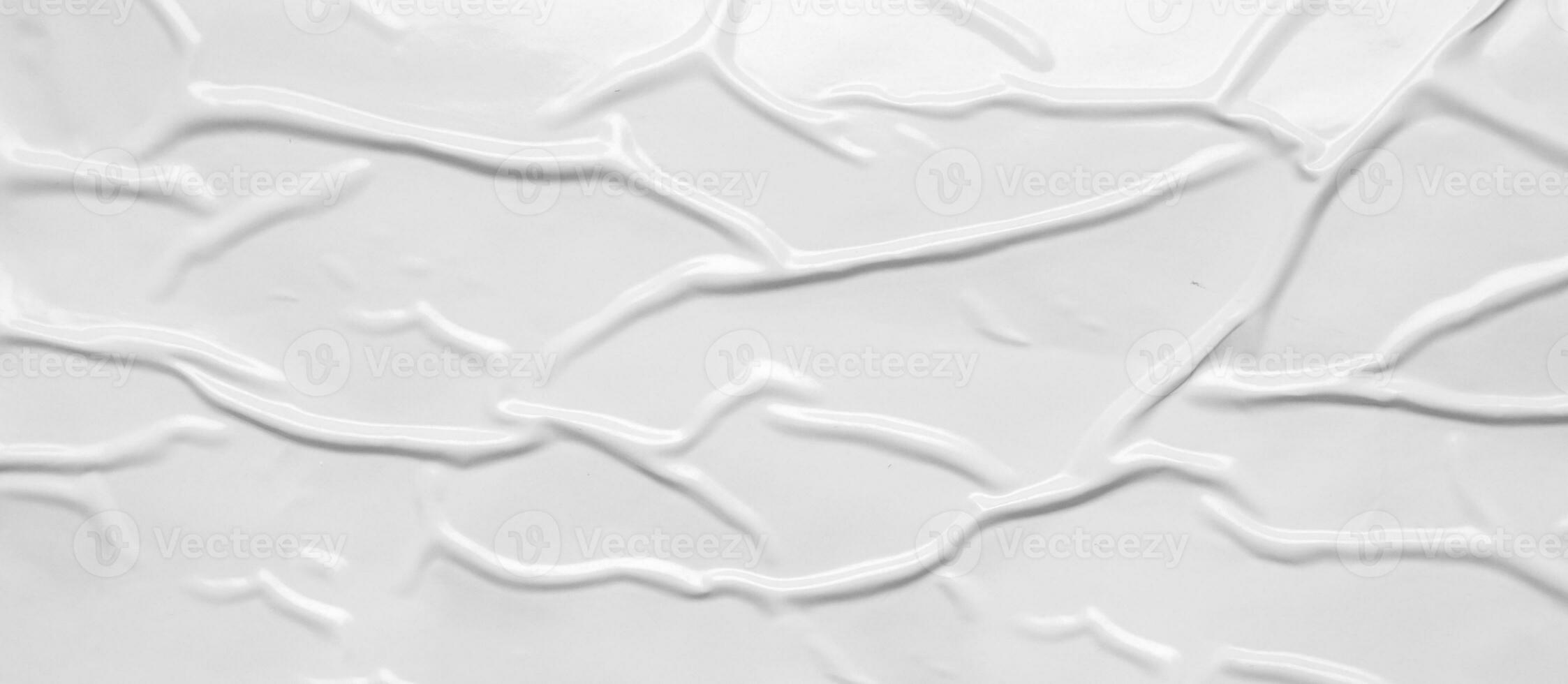 white crumpled and creased plastic bag texture background photo