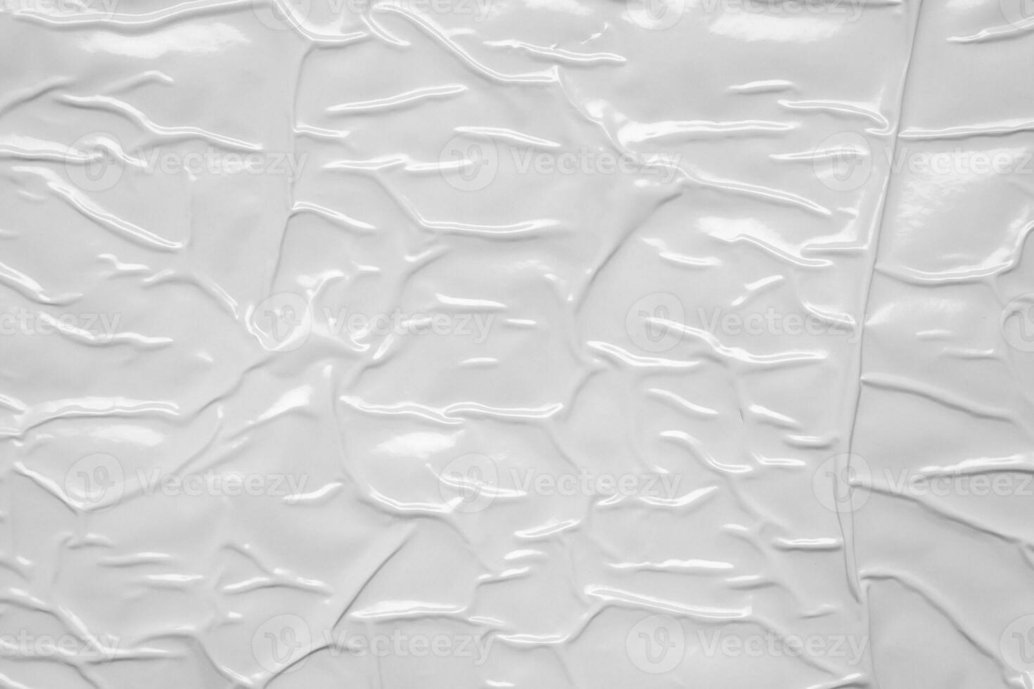 white crumpled and creased plastic bag texture background photo