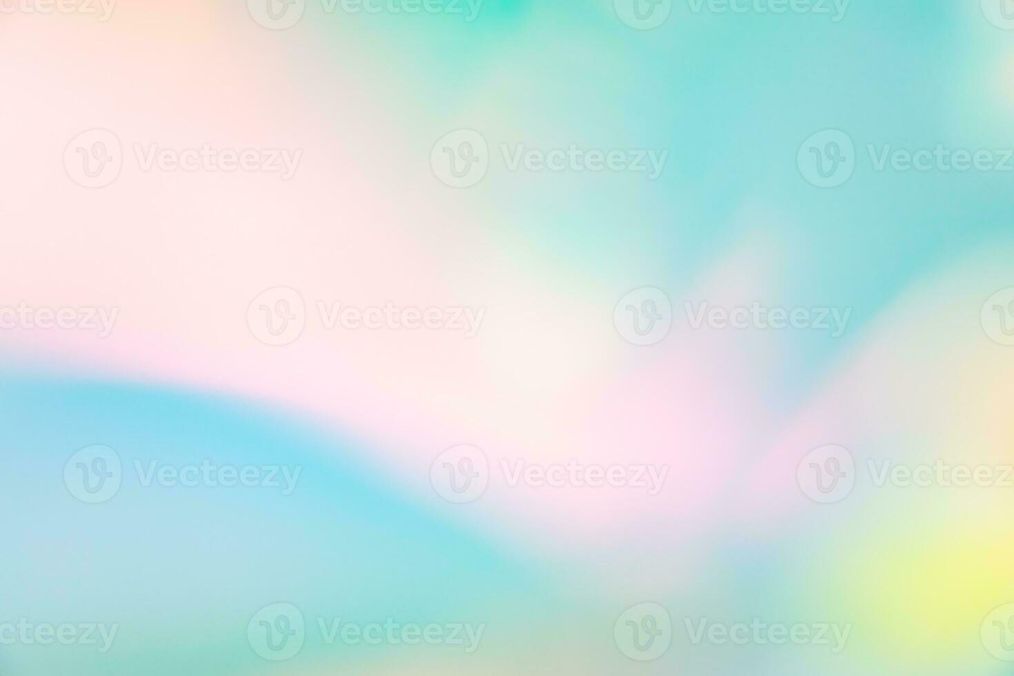 Abstract blur holographic rainbow foil iridescent background photo